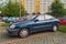 Old sedan car green Daewoo Lanos parked