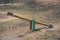 Old seesaw on vintage outdoor playground - abandoned playground