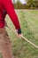 old senior farmer raking lawn