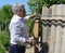 Old, senior, people, man, elderly, man, outdoor, portrait, Mature, work, wall, outdoor, smiling, happy, construction, axe, carpent