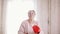 An old senior woman boxing