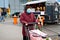 Old senior woman wear medical mask, protection against pandemic coronavirus disease. 90 years retired female lady push