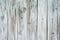 Old shabby boardwalk gray background for copy space. Part of a wooden fence