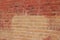 Old shabby chic pink and beige color brick wall texture with a blotchy abstract look