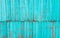 Old shabby painted fence. Rural abstract backgrounds