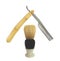 Old shaving brush and straight razor