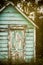 Old shed with worn Paint and old Door