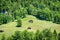 Old sheds huts on a green mountainsides