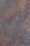 Old sheet metal, weathered very rusted steel, red rust on metal. Grunge background, textured surface, outdoor material, closeup