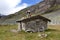 Old shelter made by stones and wood in norwegian wilderness