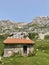 Old shelter, mountains, grass and scenic view