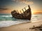 Old ship. Old ruined ship on the shore. Wooden abandoned ship at sunset