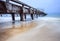 Old ship pier and sea wave in storming season