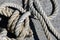 Old Ship rope knot on pier background