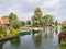 Old shipyard and houses along canal in Edam, Noord-Holland, Netherlands