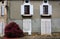 Old shuttered windows and old stonework, France