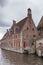 Old Sint Jans Hospital along canal in Bruges.