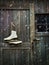 Old skates hanging on barn door