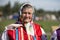 Old Slavic woman in national dress. Russian granny in a scarf.