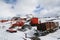 Old sledge and polar tractor [ca 1950s],quonset hut,