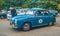 Old small blue car Syrena 104 starting front view