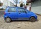 Old small blue compact car Daewoo Matiz private car parked