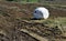 Old small bungalow in a field