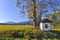 Old small chapel of Pensive Christ in autumn sunny day, Skwirtne village, Low Beskids Beskid Niski, Poland.