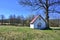 Old small  chapel under tree, Blechnarka, Low BeskidsBeskid Niski, Poland