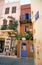 Old small colorful hostel building with rooms for rent in Chania, Crete.