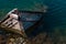 Old Small Mediterranean Fishing Boat Sinking inside the Pier of Nea Artaki in Euboea - Nea Artaki, Greece