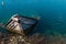 Old Small Mediterranean Fishing Boat Sinking inside the Pier of Nea Artaki in Euboea - Nea Artaki, Greece