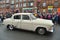 Old Soviet car Volga GAZ-21 on a street parade