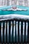 Old Soviet car Volga. Turquoise retro car covered with snow. GAZ-21 on the street