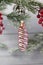 Old soviet decoration on the Christmas tree  glass toy icicle close up on light background