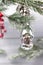 Old soviet decoration on the Christmas tree  glass toy tiny house close up on light background