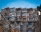 Old soviet residential building is seen through electrical wires