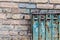 Old Soviet-style mailboxes. Old metal and numbered mailboxes on brick wall