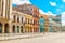 Old Spanish colonial living colorful houses across the road in t