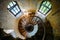 Old spiral staircase in abandoned mansion, upside view