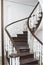 Old spiral staircase with wooden stairs