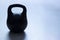 Old sports weightlifting equipment - cast iron kettlebell with copy space