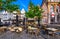 Old square with tables of cafe in Ghent Gent, Belgium.