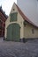 Old stable building that has been converted into a garage in crossroad of Palasta and Maza Skolas medieval streets in Old Riga.