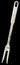 Old Stainless Steel Meat Carving Fork Front Side Isolated On Black Background