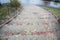 Old stairs with pebbles in the city. Stones road