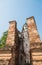 Old stand buddha statue in the ancient temple Thailand