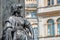 Old statue of a sensual woman warrior, Amazonian, as defender with lion head and club at the Neumarkt in downtown of Dresden,