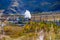 Old steam locomotive in the Circum-Baikal Railway with smoke in autumn