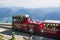 An old steam locomotive is climbing up the'schafbergbahn' on to the top of the Schafberg